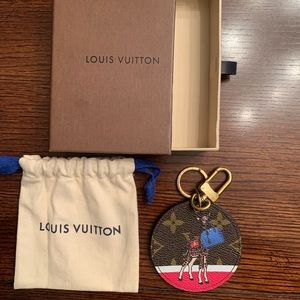 Louis Vuitton Illustre Giraffe keychain/bag charm in original dust cover & box.